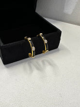 Load image into Gallery viewer, Silver Hoop Earrings In Black Enamel
